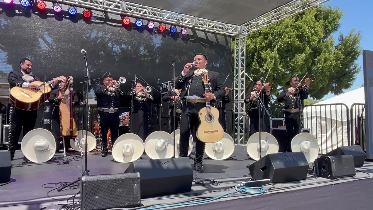Mariachi Gallos De Oro performing on the Camarillo Fiesta stage with professional stage monitors